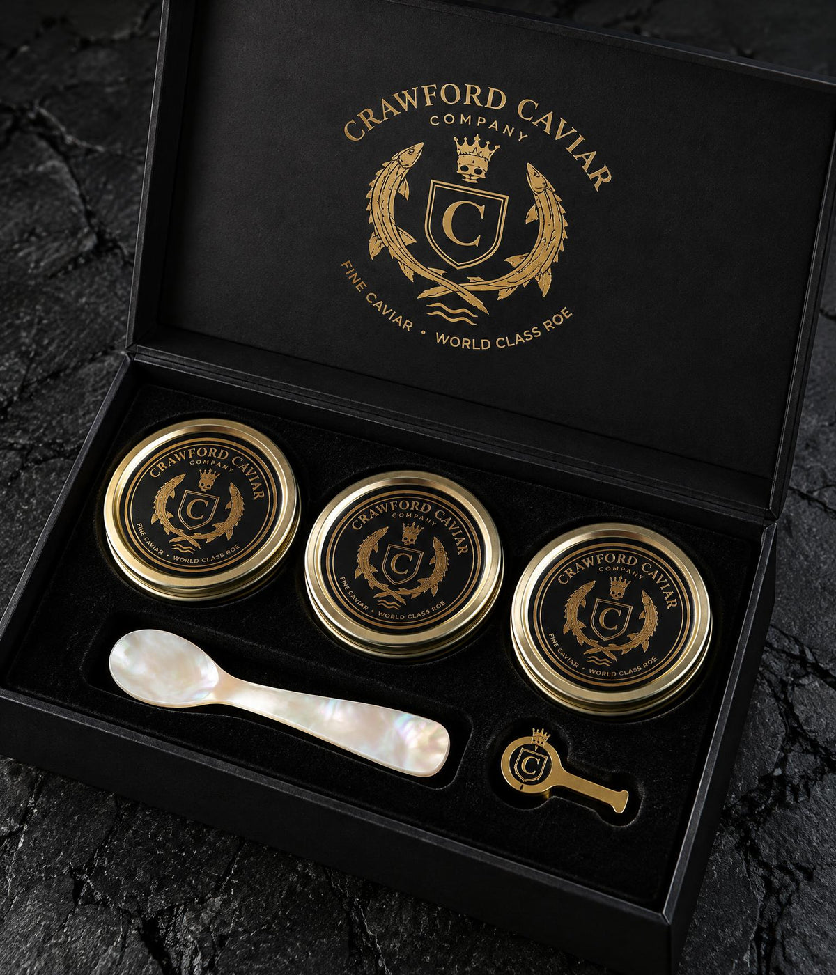 Crawford Caviar gift box with three 1 oz tins, a mother-of-pearl spoon and a caviar key.